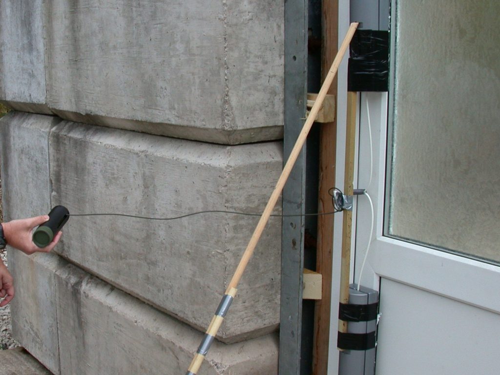 Breachers Boot charges in position against a UPVC door