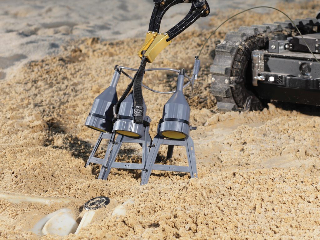 An ROV positions an array of Pluton shaped charges