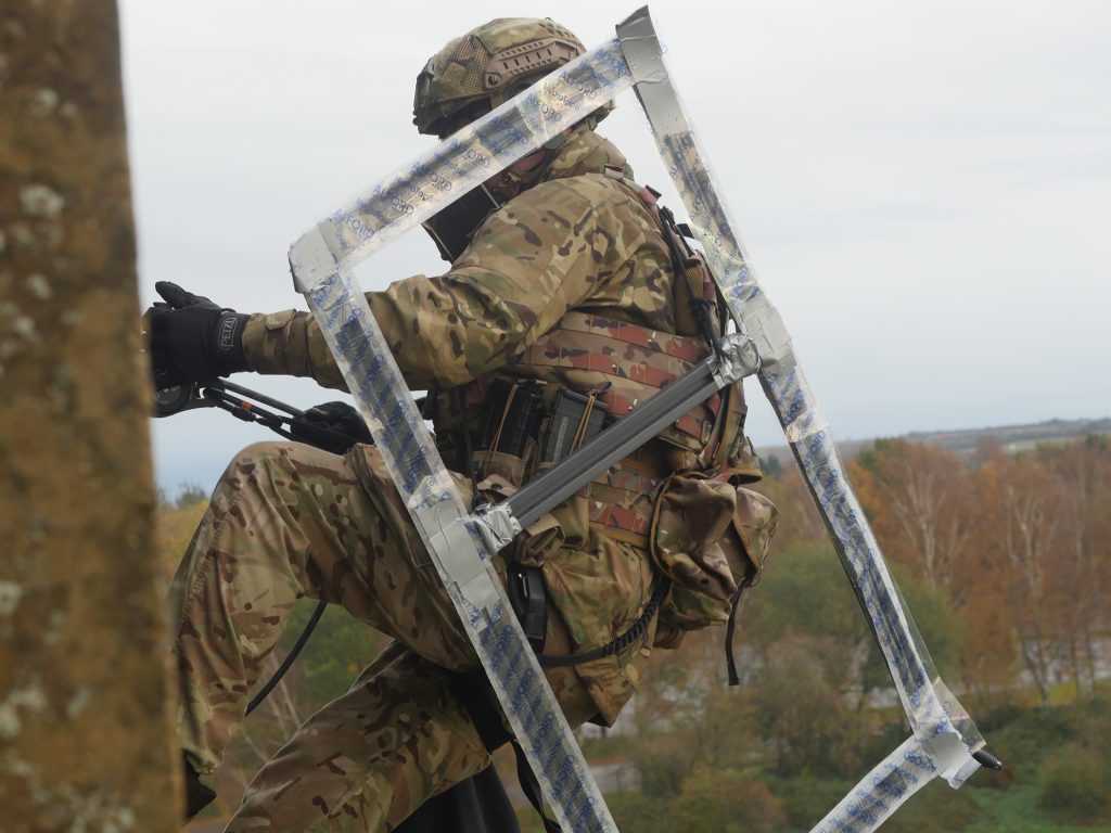 An operator on vertical assault with Alford Strip