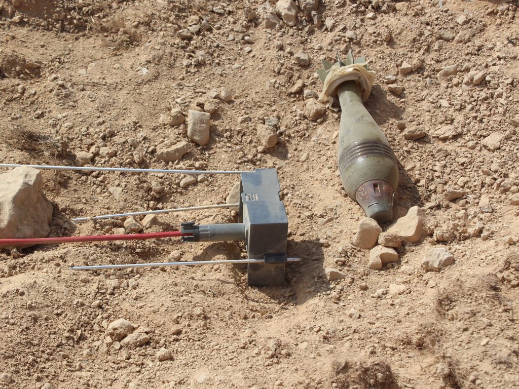 Tekton fuse removal tool positioned against a mortar