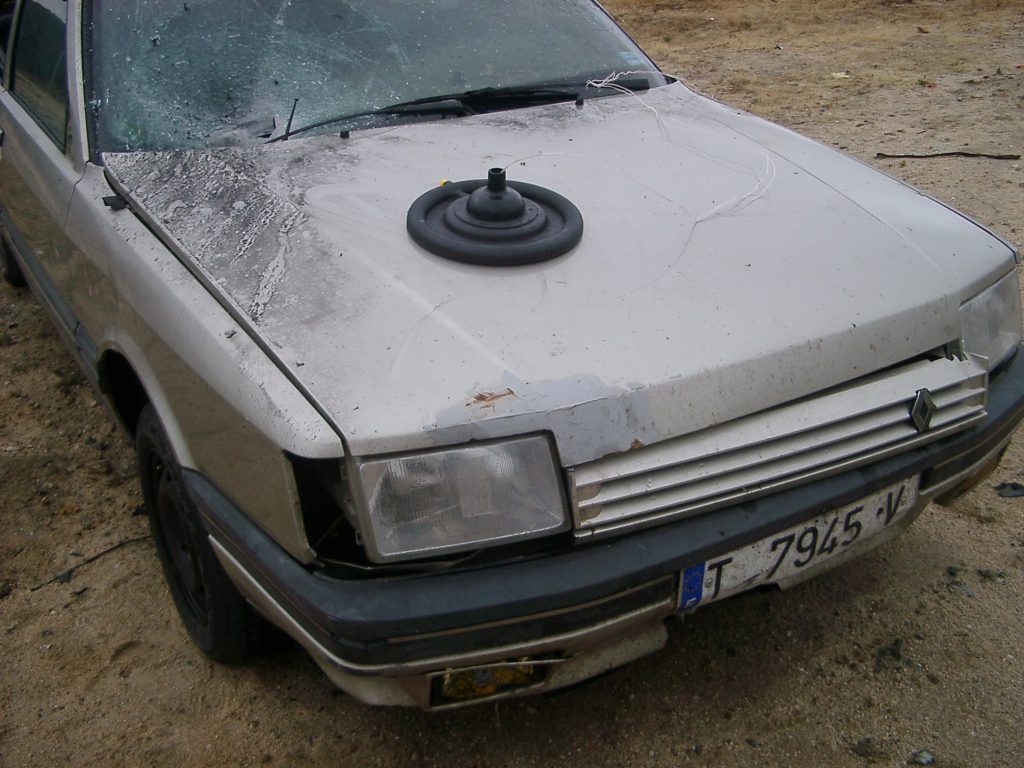 Van Trepan in positioned against a car bonnet (hood)