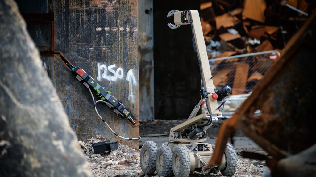 An ROV positions explosive charges during an Alford demolition project